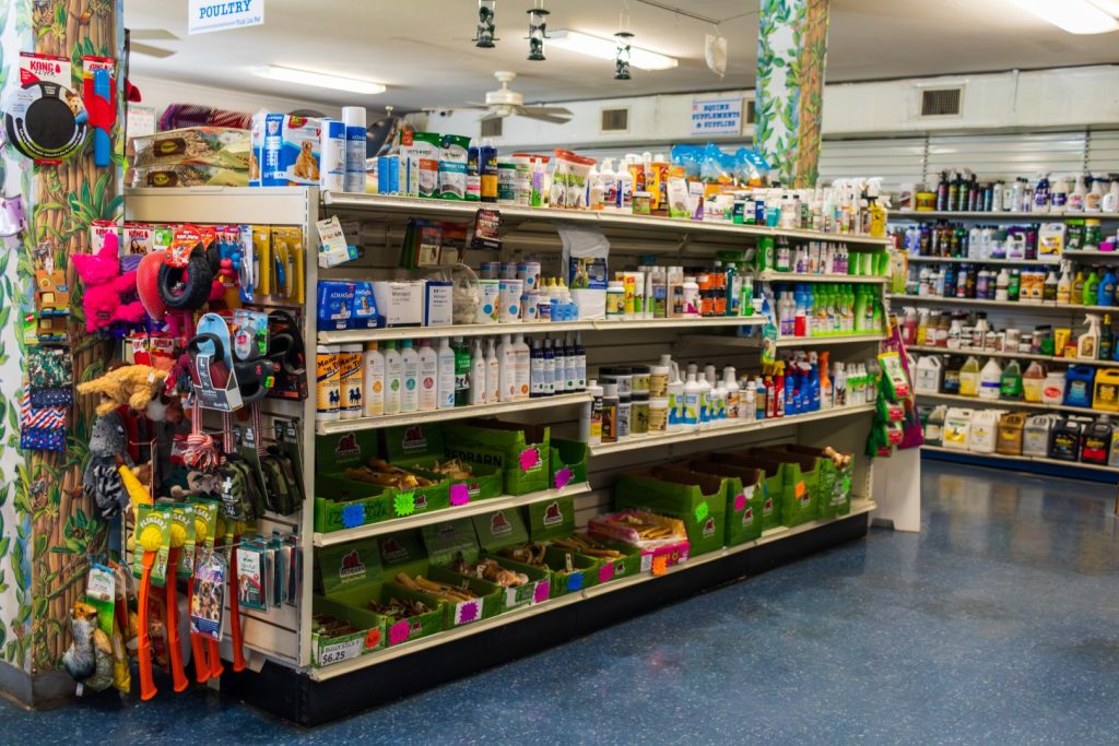 Pet supplies aisle inside the Finish Line Feed store